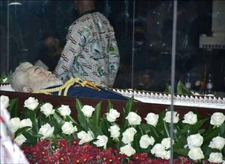 Public file past mortal remains of late Rawlings as his body lies in State