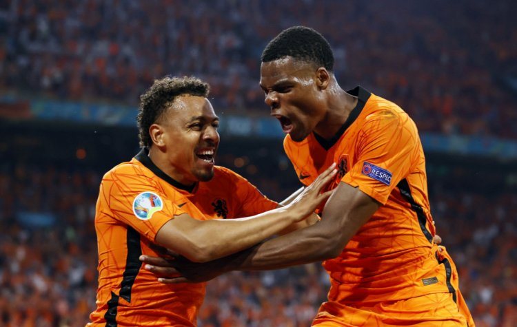 Netherlands grab 1/16 spot after a 2-0 win over Austria
