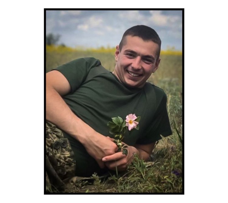 In Ukraine, a young soldier's funeral is held in solitude.