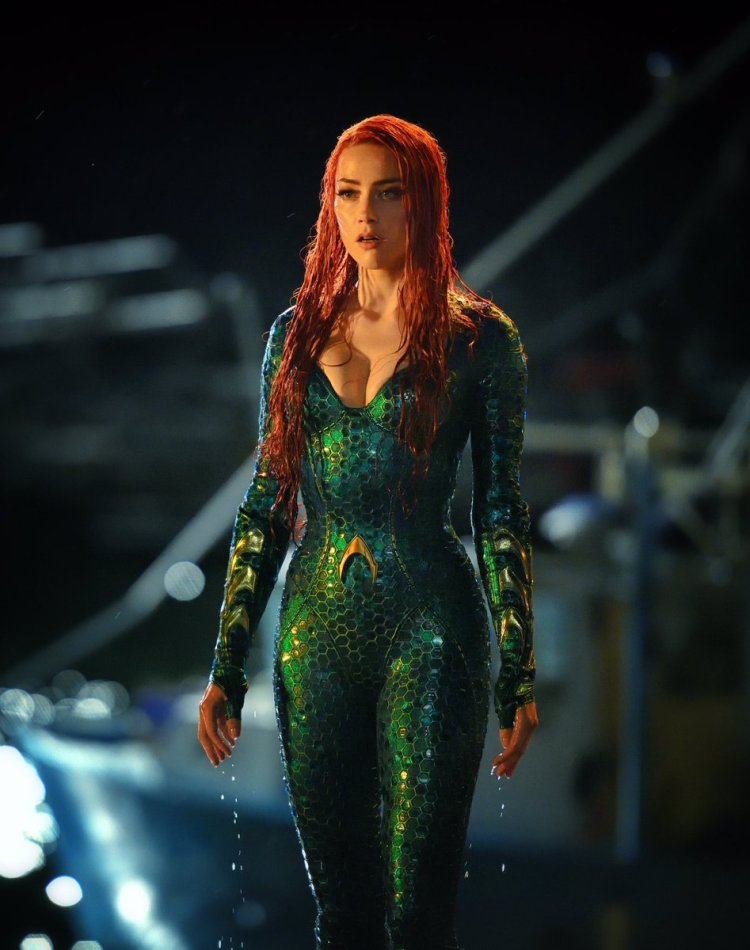 Amber Heard refutes the'slightly insane' claim that she was dropped from the sequel to 'Aquaman.'