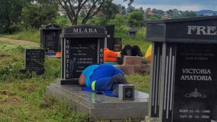 Workers face charges for sleeping on top of graves