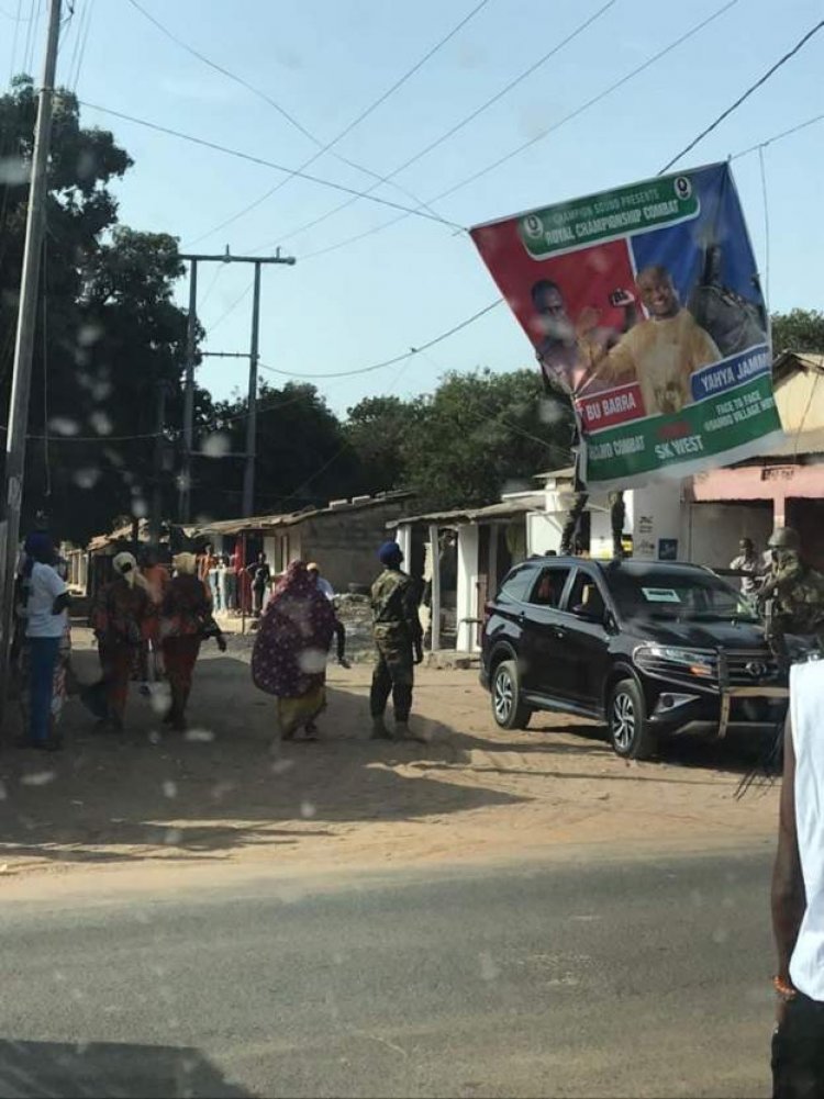 Gambian army 'sorry' after soldiers tear off opposition posters